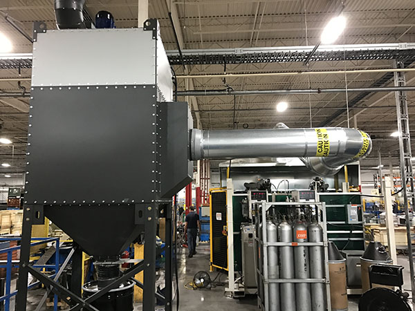 Roof, ducts and Airhawk cartridge dust collector installed by C&C Mechanical for Commercial Roll Formed Products Ltd. in Brampton, Ontario.
