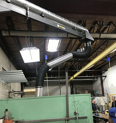 Stationary Fume Extractor installed by C&C Mechanical for Millworks Custom Manufacturing in Toronto, Ontario.